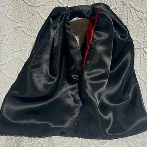 Elegant Black Satin Handbag with Red Lining